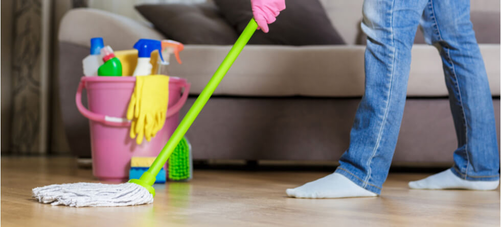 How do you clean commercial hardwood floors?